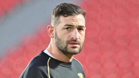 Jonny May standing on the pitch during a pre-match warm up