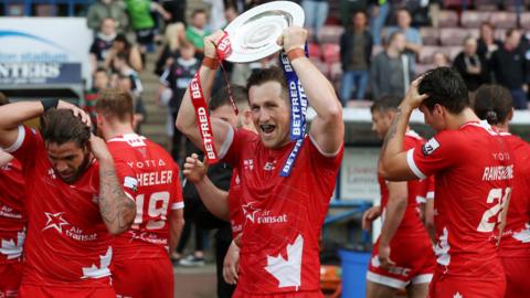Toronto celebrate their League Leaders' Shield win in the Championship
