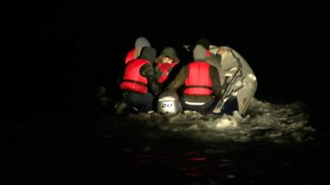 Migrants in a dinghy