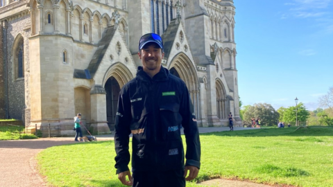 Josh Patterson in front of St Albans Cathedral