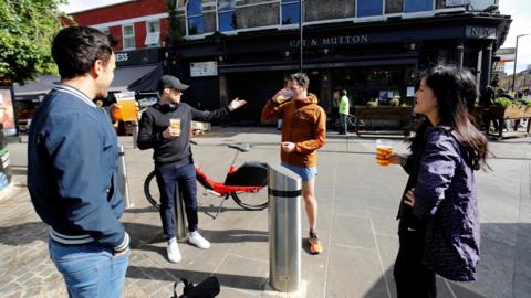 Socially distanced drinkers at Broadway Market, London