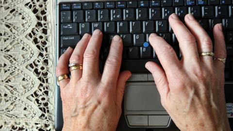 Women uses laptop computer