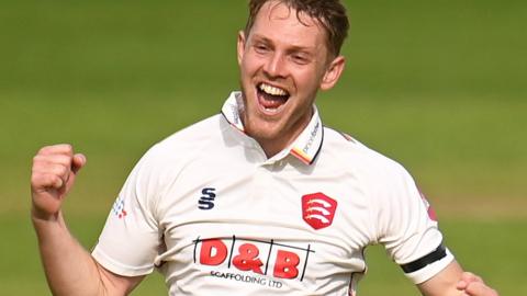 Jamie Porter celebrates wicket