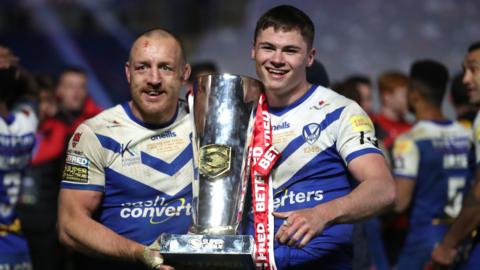 James Roby and Jack Welsby with the Super League trophy