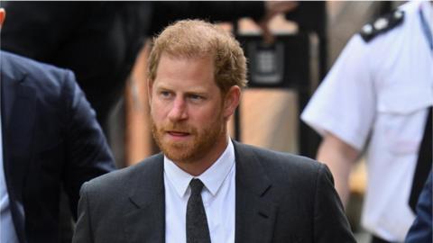 Prince Harry arrives at the High Court, in London, 30 March