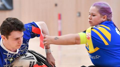 Leeds' Jodie Boyd tackles Halifax's Rob Hawkins