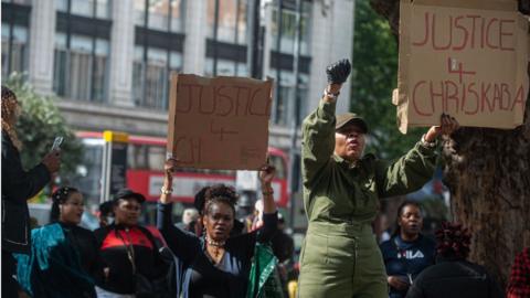 Protestors outside of Brixton Police station