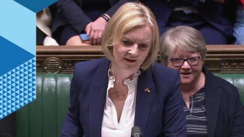 Liz Truss standing at the despatch box in the House of Commons