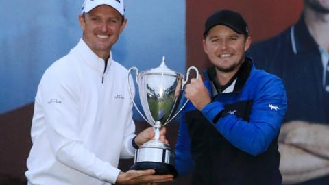 Justin Rose presents the British Masters trophy to Eddie Pepperell