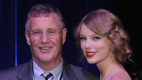 Scott Swift and daughter Taylor Swift at the 2011 CMT Artists of the year celebration at the Bridgestone Arena on November 29, 2011 in Nashville, Tennessee.