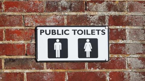 Public toilet sign