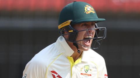 Australia's Marnus Labuschagne celebrates beating India