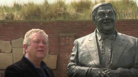 Jon Culshaw with a statue of comedian Les Dawson