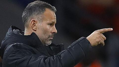 Ryan Giggs makes a point to his Wales players