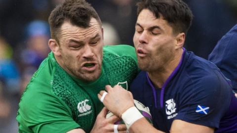 Scotland's Sean Maitland is tackled by Cian Healy