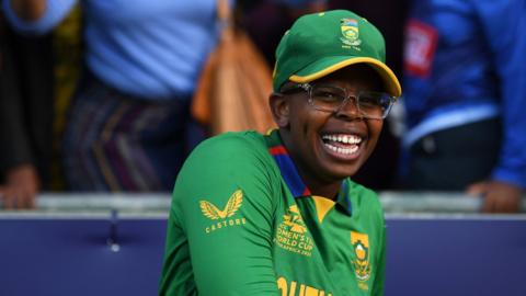 South Africa cricketer Sinalo Jafta smiles after reaching the T20 World Cup final