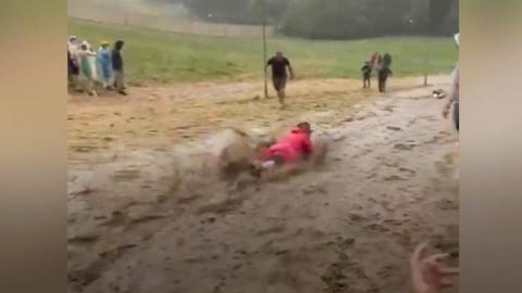 Mud-sliding at Standon Festival