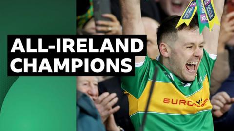 Glen's Connor Carville lifts the All-Ireland trophy