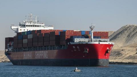Container ship going through Suez Canal to Red Sea Jan 2024