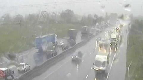 A traffic camera image of traffic queued on the M6