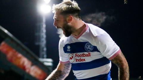 Charlie Austin celebrates scoring a goal for QPR