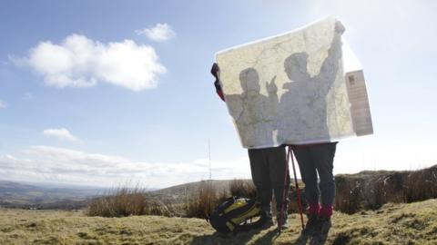 Walkers with a map