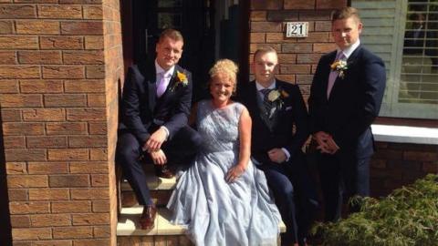 Ms Fenton, pictured with her sons, says her health needs have become more complex in her fifties