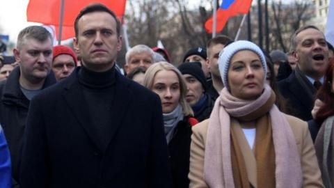 Alexei Navalny, his wife Yulia, and other demonstrators march in memory of killed Kremlin critic Boris Nemtsov in Moscow on 29 February 2020