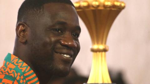 Ivory Coast coach Emerse Fae with the Africa Cup of Nations trophy