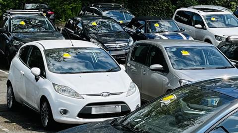 Cars in the Duke Street car park, High Wycombe, with parking fines on them