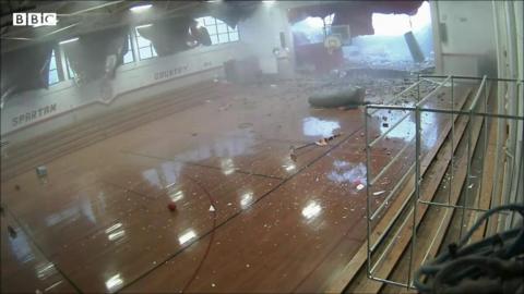 One wall of the gym was knocked down