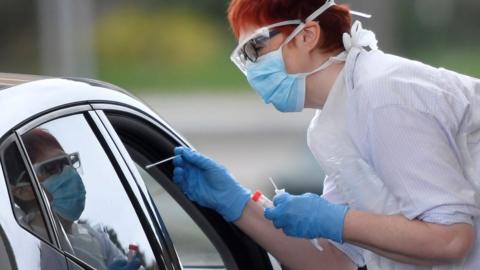 A coronavirus test being done in Chessington