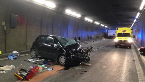 Photo from Cantonal Police Uri shows traffic accident between a car and a truck in the Gotthard tunnel near the village of Hospental, Switzerland, 13 December 2017