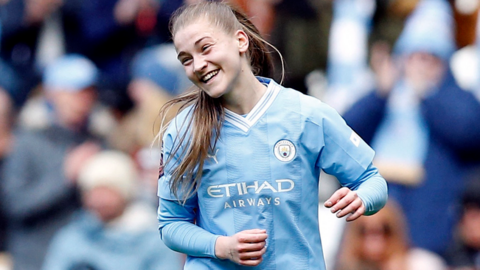Manchester City celebrate taking the lead against Manchester United in the Women's Super League