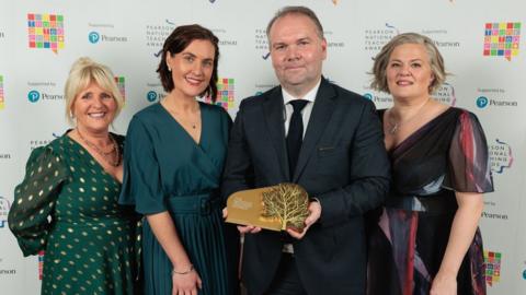 Staff from Limavady High School with the award for UK secondary school of the year