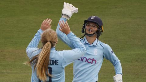 England's Sophie Ecclestone and Amy Jones celebrate a wicket