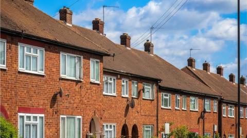 A row of red brick houses