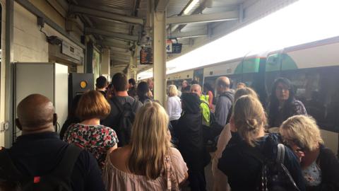 Passengers on a train platform