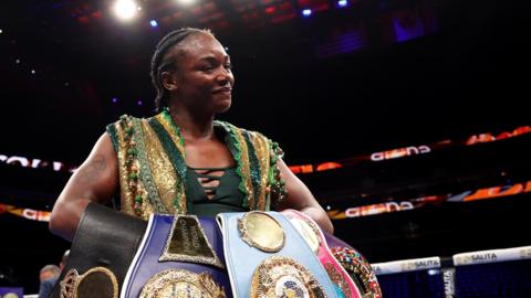 Claressa Shields celebrates with her boxing world title after beating Maricela Cornejo in June