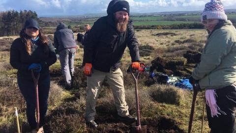 People taking part in a dig