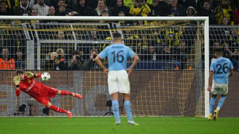 Riyad Mahrez (right) misses penalty