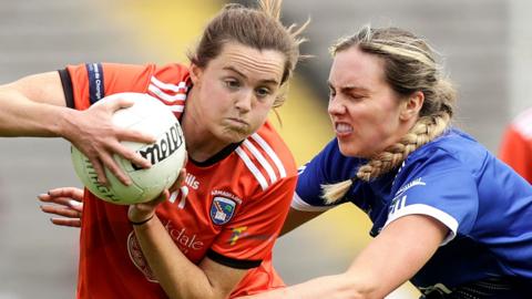 Armagh forward Aimee Mackin is challenged by Cavan's Rebecca O'Neill