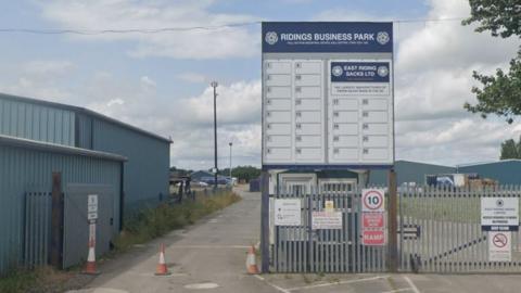 Entrance to East Riding Sacks factory with sign
