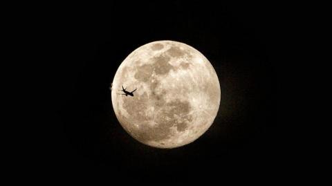 The Harvest Moon photographed above Indonesia