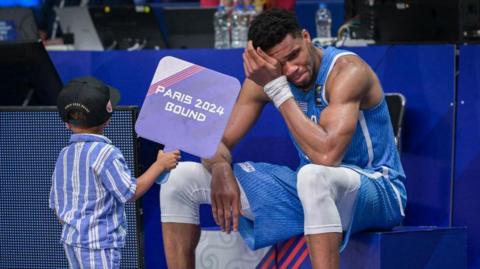 Greece basketball player Giannis Antetokounmpo is in tears after his side qualified for the 2024 Olympics