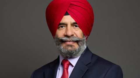 Official photograph of Jas Athwal, the Labour MP for Ilford South.