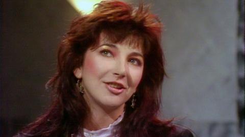 Kate Bush in medium close up talking