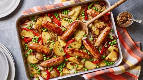 Sticky sausage and potato traybake
