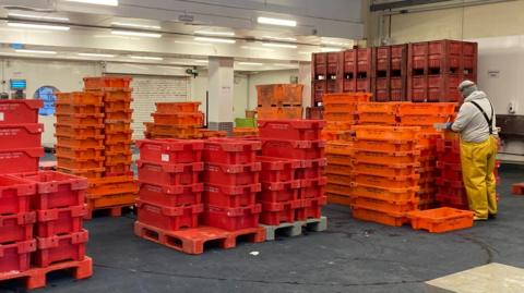 Fish crates stacked at the Fish Market 