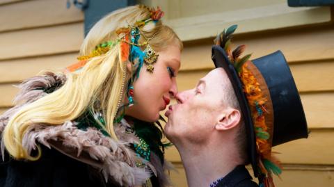Tinder couple kiss